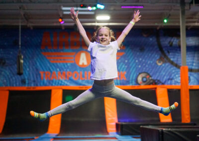 A girl jumping on a trampoline