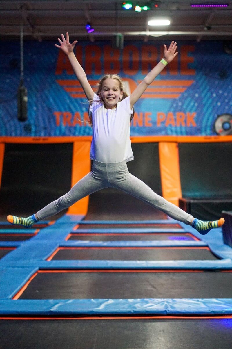 A girl jumping on a trampoline